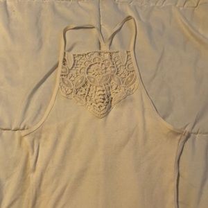 Cream colored tank top. Size medium.